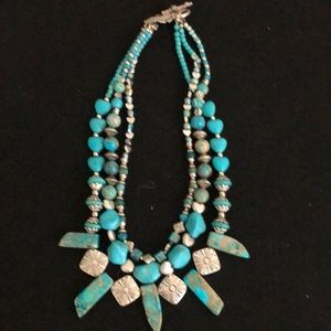 Three strand turquoise necklace With silver accent beads silver accent beads
